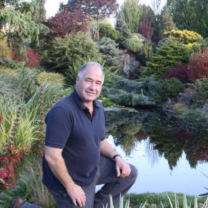 John in his garden, one of the finest private gardens in the UK